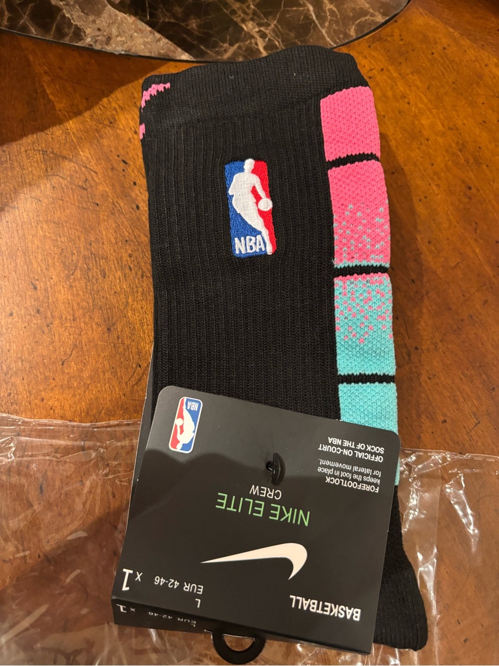 Nike NBA Elite Crew socks in a Miami City black, teal, and pink colorway